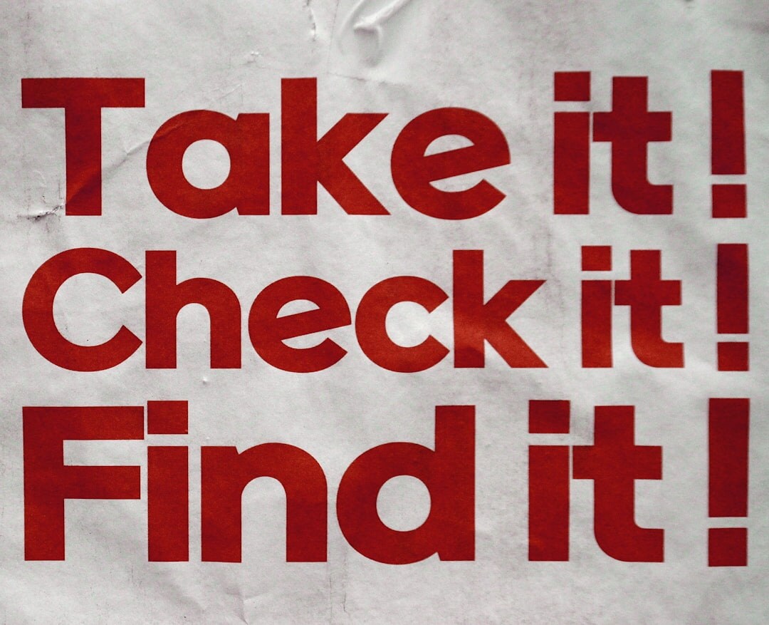 Journalists reviewing documents and video footage while fact-checking a claim in a newsroom