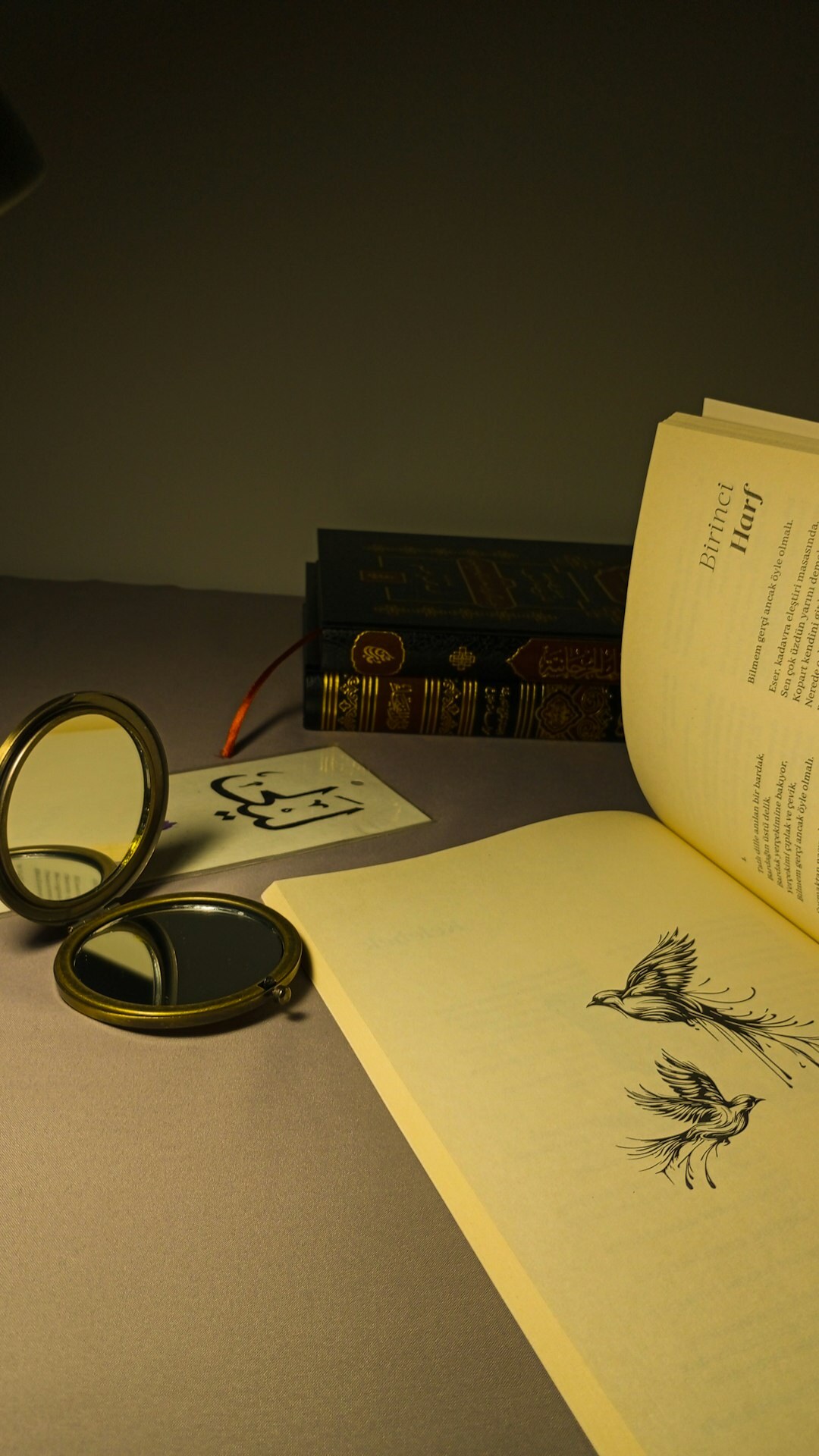 Magnifying glass over printed documents and source citations on a desk