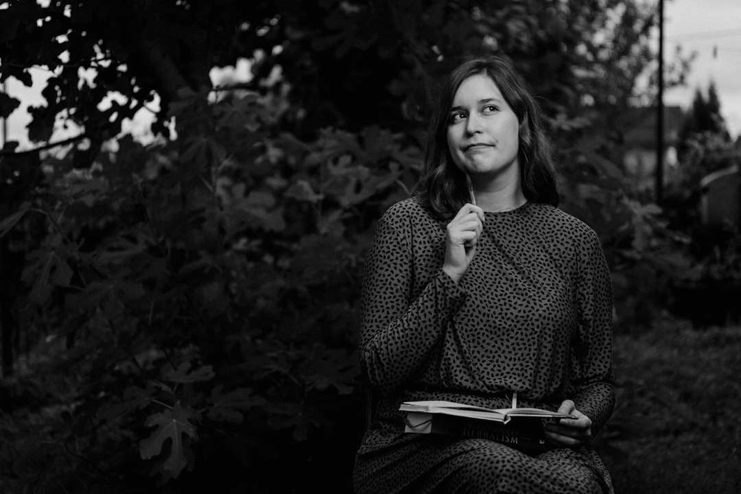 Studio portrait of a Swiss female investigative journalist in her 40s